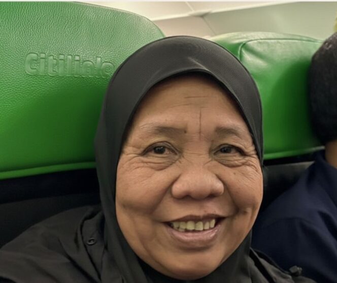 
					Asih saat di bangku pesawat | Foto Istimewa