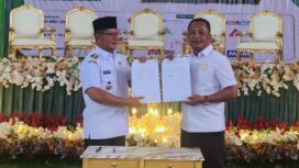 Penandatanganan Kerja sama Bupati Pasaman Welly Suhery dengan Direktur PT Alqurrny Bagas Pratama Halili Priyadi