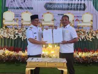 Penandatanganan Kerja sama Bupati Pasaman Welly Suhery dengan Direktur PT Alqurrny Bagas Pratama Halili Priyadi